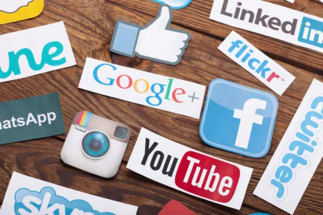 KIEV, UKRAINE - AUGUST 22, 2015:Collection of popular social media logos printed on paper:Facebook, Twitter, Google Plus, Instagram, Pinterest, Skype, YouTube, Linkedin and others