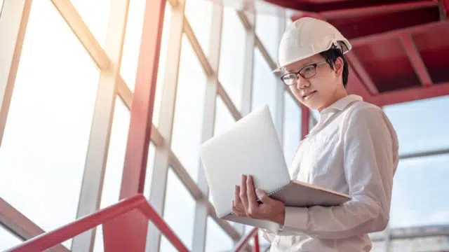 Asian civil engineer man working at construction site