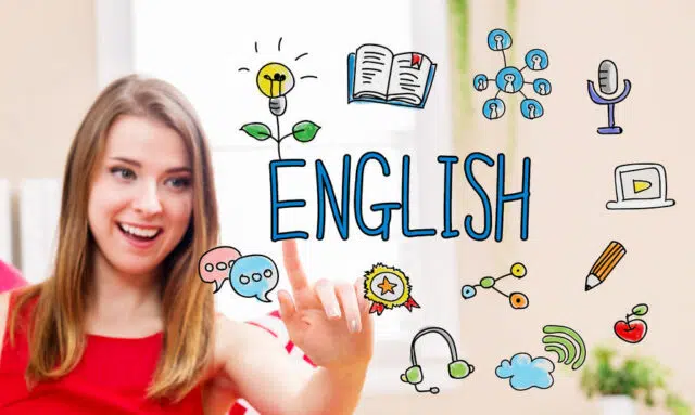 53676470 - english concept with young woman in her home
