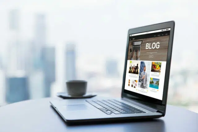 laptop computer with blog web page on screen