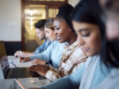 Black woman, education and student with university, study with laptop and research for project in c