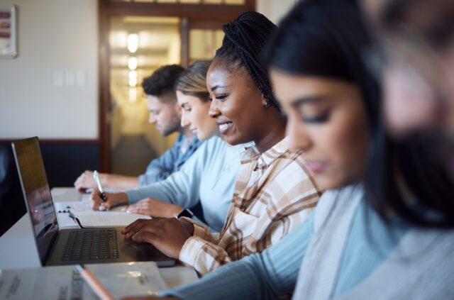 Black woman, education and student with university, study with laptop and research for project in c Black woman, education and student with university, study with laptop and research for project in c