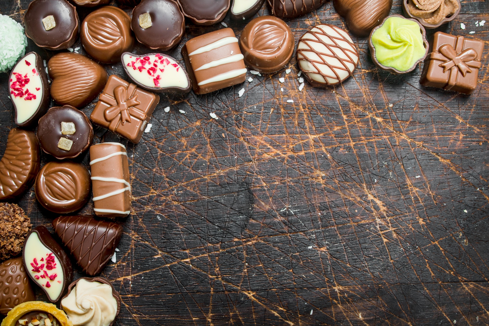 Chocolate sweets with nuts and various fillings.