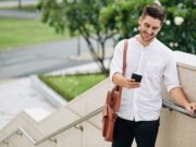Man reading text message