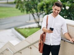 Man reading text message