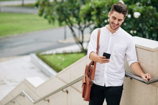 Man reading text message