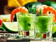 Shrimp cocktail with avocado sauce and lime