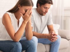 Depressed Couple Sitting Together After Break Up Conversation Indoor