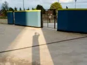 a shadow of a person on a concrete surface