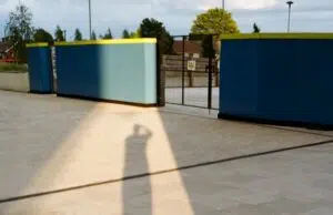 a shadow of a person on a concrete surface