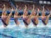 découvrez l'histoire fascinante de la natation synchronisée aux jeux olympiques, une discipline alliant grâce, précision et performance sportive.